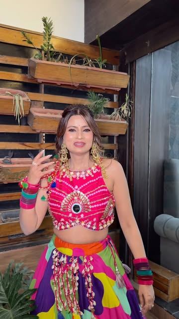 Colourful mehendi look with pink blouse
